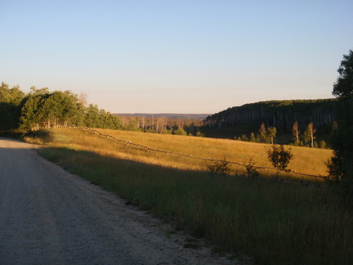 The sun kisses the grazing land of Aspen Valley Ranch.